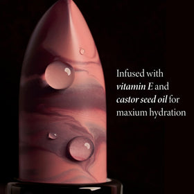 LAURA GELLER texture applied on lips showing smooth hydration and subtle sheen