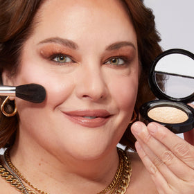 LAURA GELLER model applying Portofino to cheekbone for subtle lift