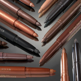 LAURA GELLER NEW YORK pencils next to fingers showing size and portability benefit