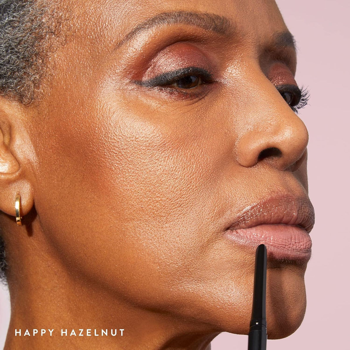 LAURA GELLER NEW YORK paired with lipstick to show layering and enhanced wear