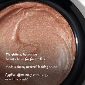 LAURA GELLER NEW YORK Honey Haze on lips demonstrating soft tint and hydrating comfort