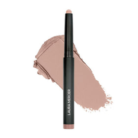 Laura Mercier front packaging showing Au Natural stick and durable case benefit