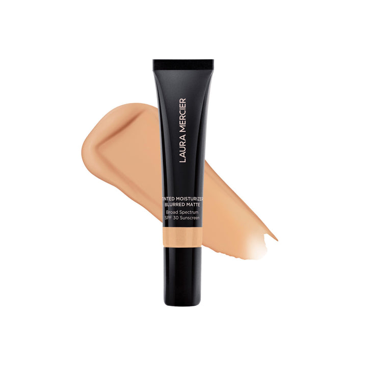 Laura Mercier front packaging shows mini skin tint, convenient travel size benefit