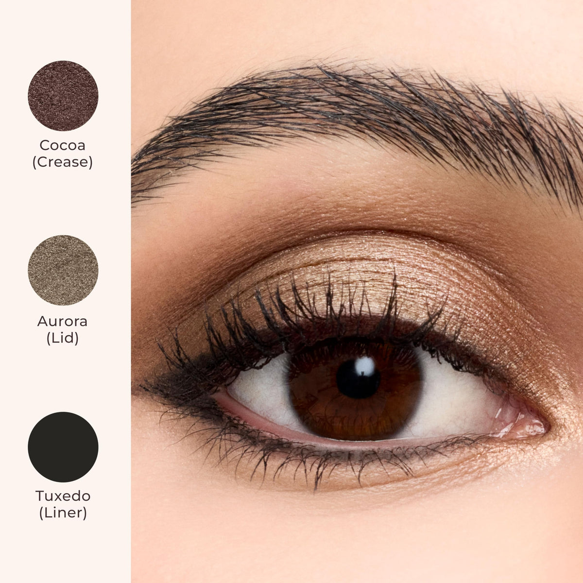 Laura Mercier stick being applied to eyelid showing easy on-the-go application benefit