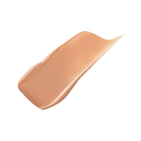 Laura Mercier dispensed foundation drop close-up showing smooth texture and hydrating finish
