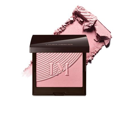 Laura Mercier front compact view showing sleek packaging and portable design benefit