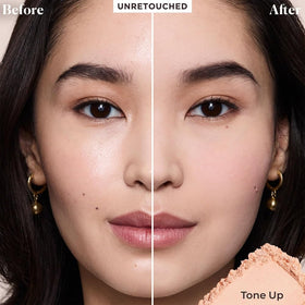 Laura Mercier jar open revealing loose powder benefit: visible fine milled texture