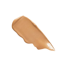 Laura Mercier on bathroom vanity showcasing daily-use, effortless glow