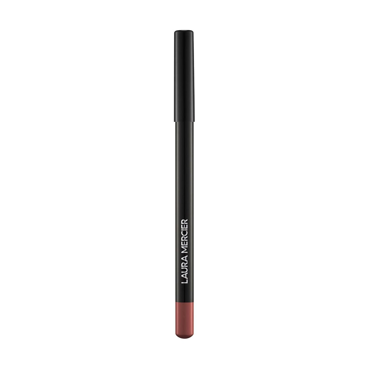Laura Mercier lip pencil inside a clutch showing convenient on-the-go touch-ups
