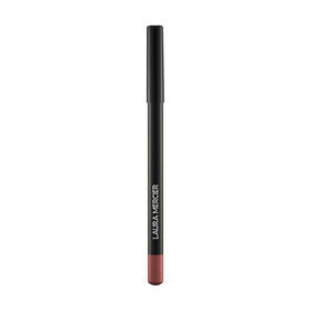 Laura Mercier lip pencil inside a clutch showing convenient on-the-go touch-ups