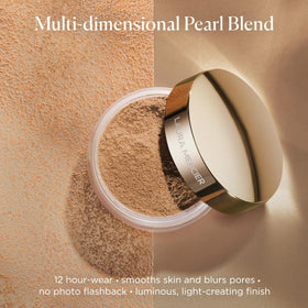 Laura Mercier powder applied with brush on model for luminous, photo-ready finish benefit