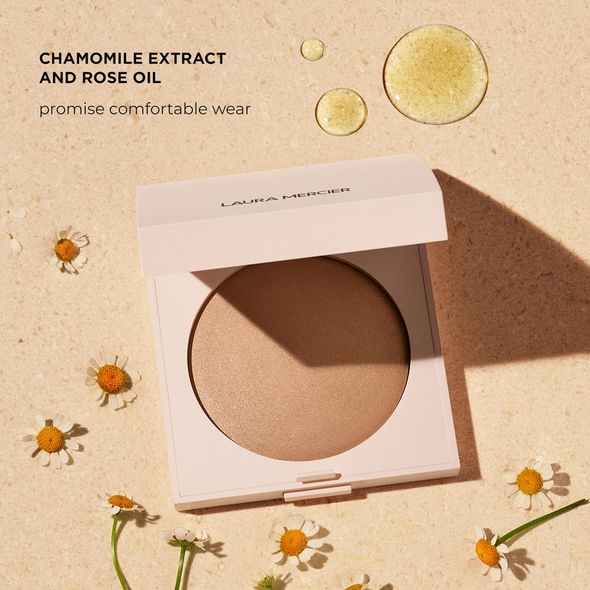 Laura Mercier lifestyle model wearing powder showing enlivened, dimensional skin