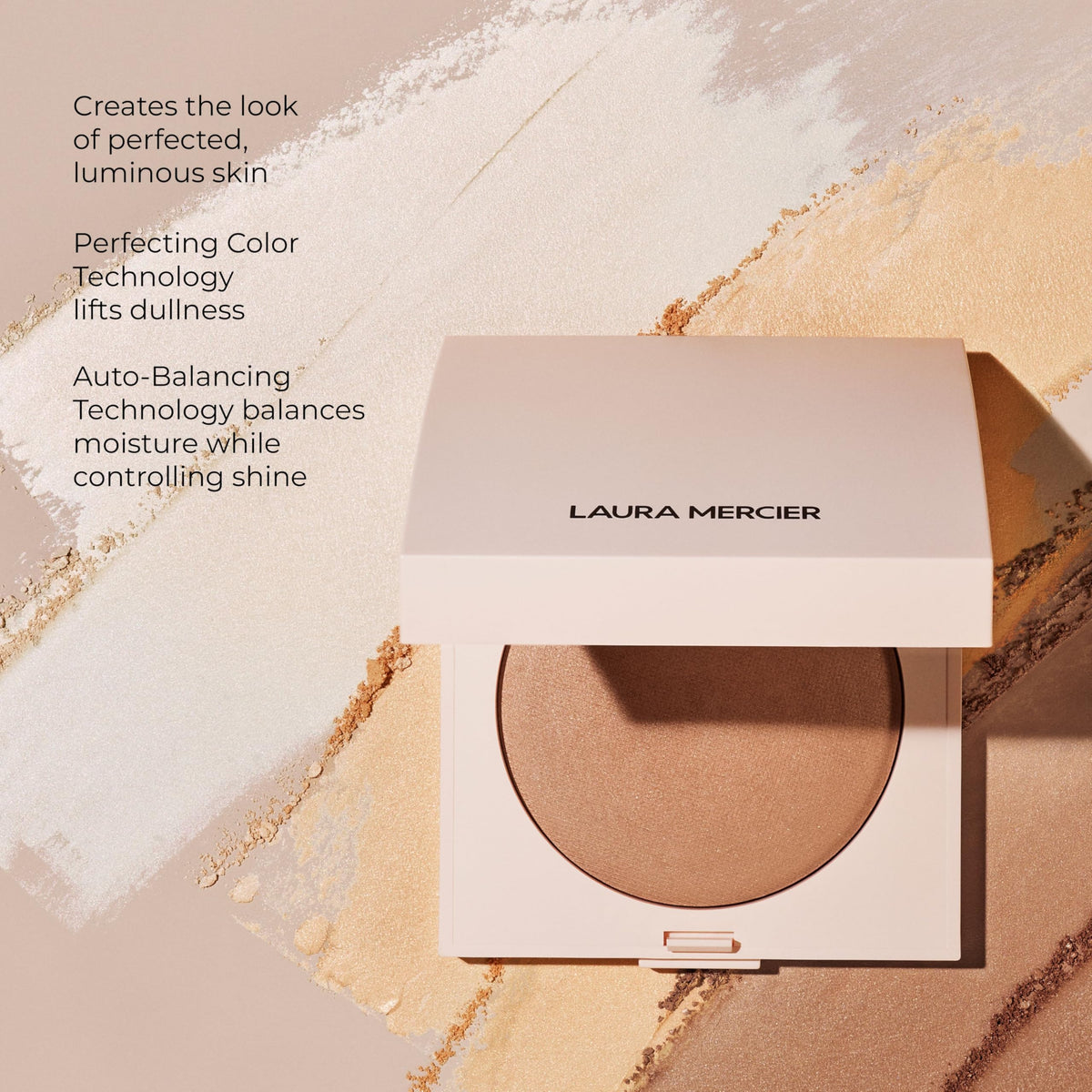 Laura Mercier powder being swept with brush demonstrating application technique and soft setting capability benefit: natural finish