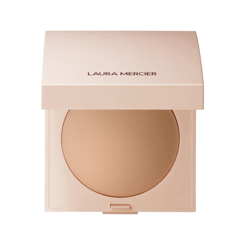 Laura Mercier compact front view showing sleek packaging and elegant branding benefit: premium presentation