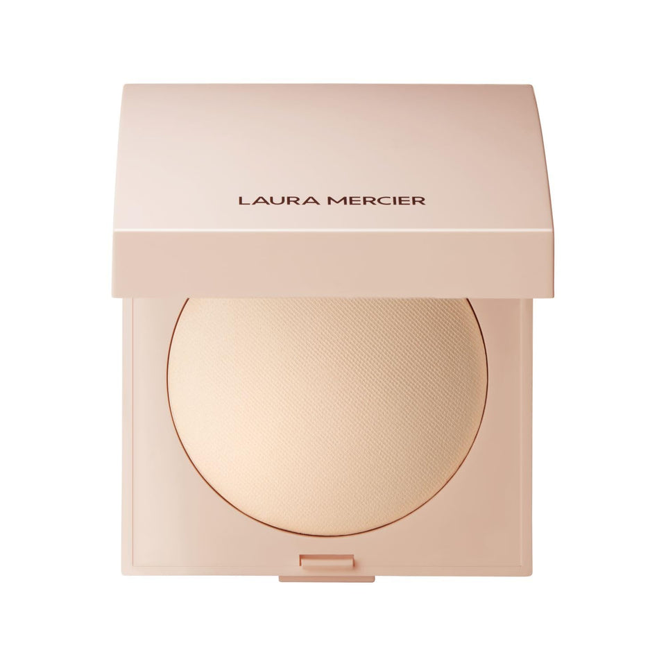 Laura Mercier compact front view showing sleek packaging and portable design benefit