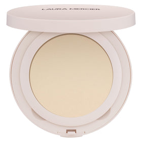 Laura Mercier front compact view showing slim portable design and secure clasp benefit
