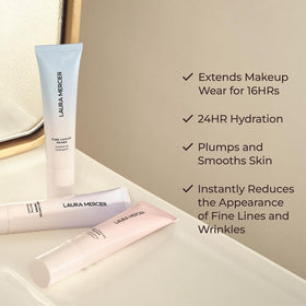 Laura Mercier primer applied on hand demonstrating smooth, plumping effect