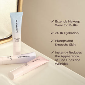 Laura Mercier primer applied on hand demonstrating blendability
