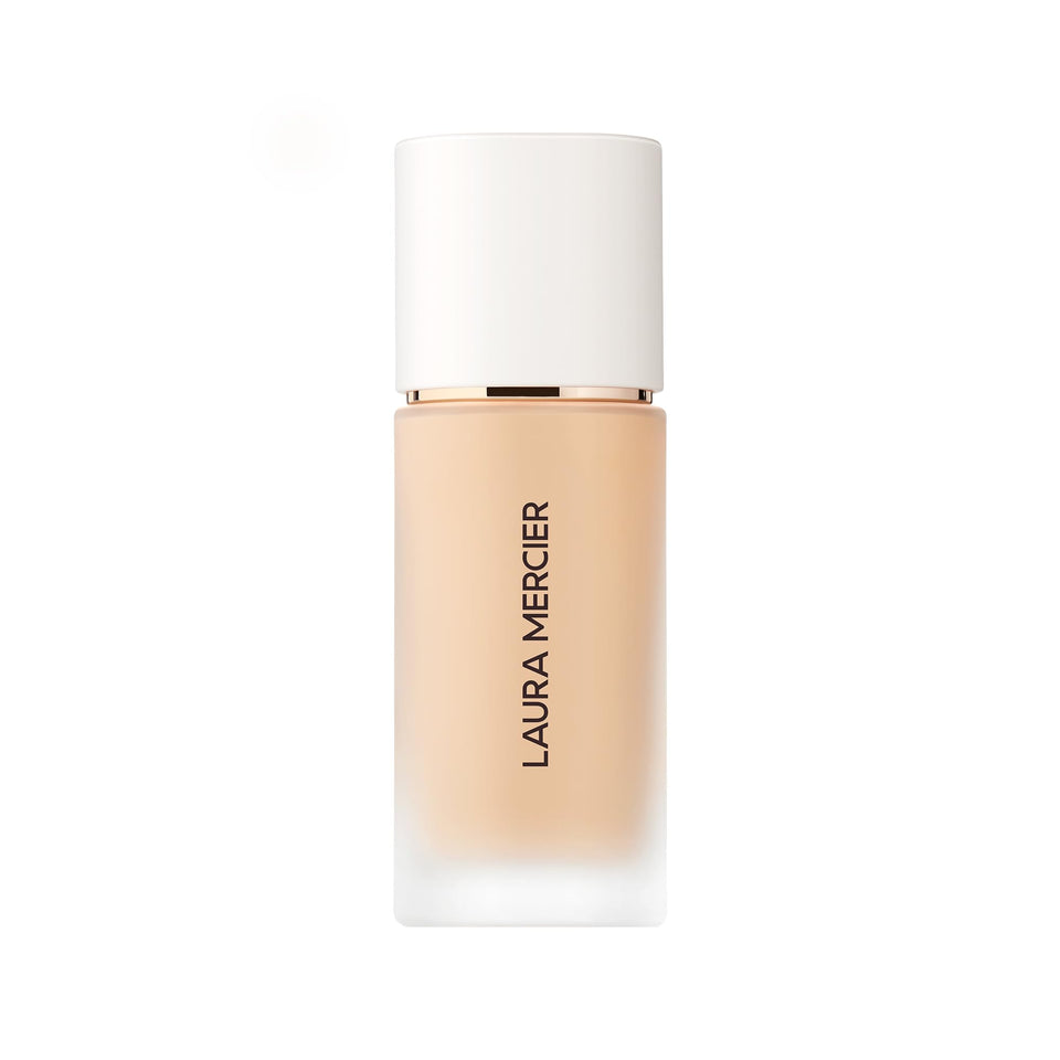 Laura Mercier front bottle view showing sleek packaging and long-wear benefit