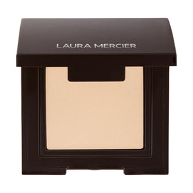 Laura Mercier Stellar front pan showing compact packaging and rich color payoff benefit