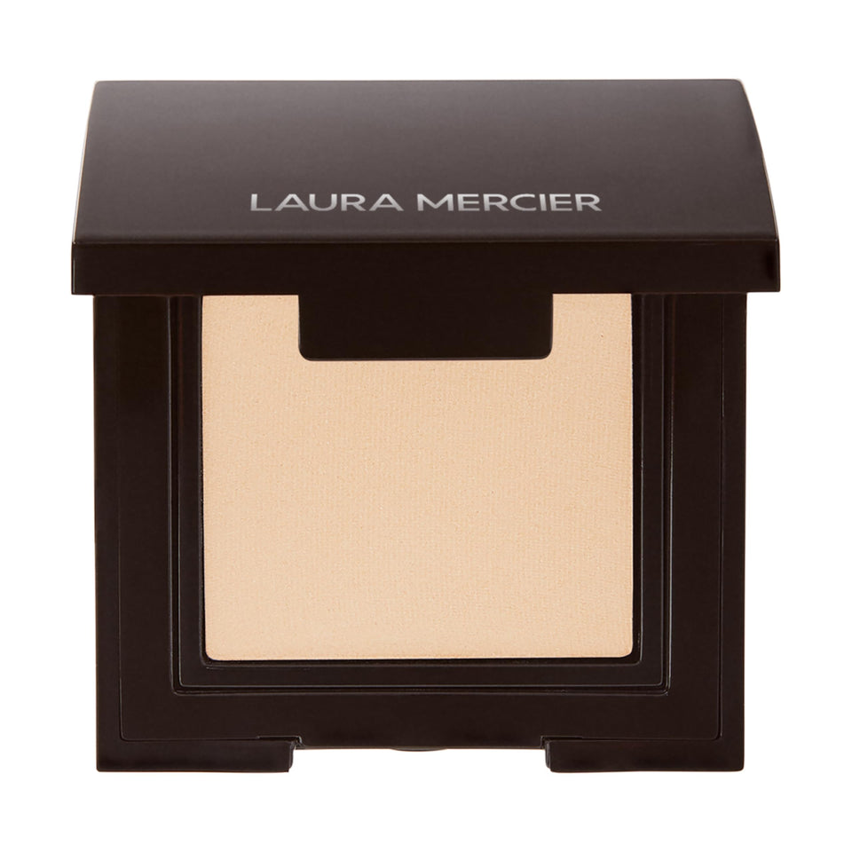 Laura Mercier Stellar front pan showing compact packaging and rich color payoff benefit