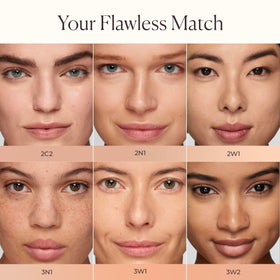 Laura Mercier swatches on arm showing shade 2W1 and buildable coverage benefit