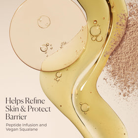 Laura Mercier blended balm on cheek close-up showing blurred pores and smooth texture