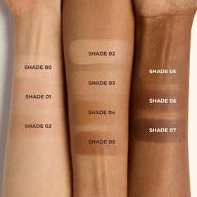 Laura Mercier swatch of Shade 03 on arm showing true color and buildable coverage