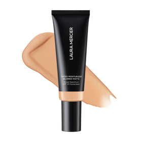 Laura Mercier front tube shot showing 2N Maple shade and packaging benefit