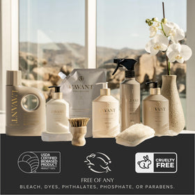 L'AVANT Collective pouring refill into glass bottle demonstrating less plastic waste