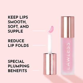 Lawless gloss swatched on lips for shade preview and fuller appearance