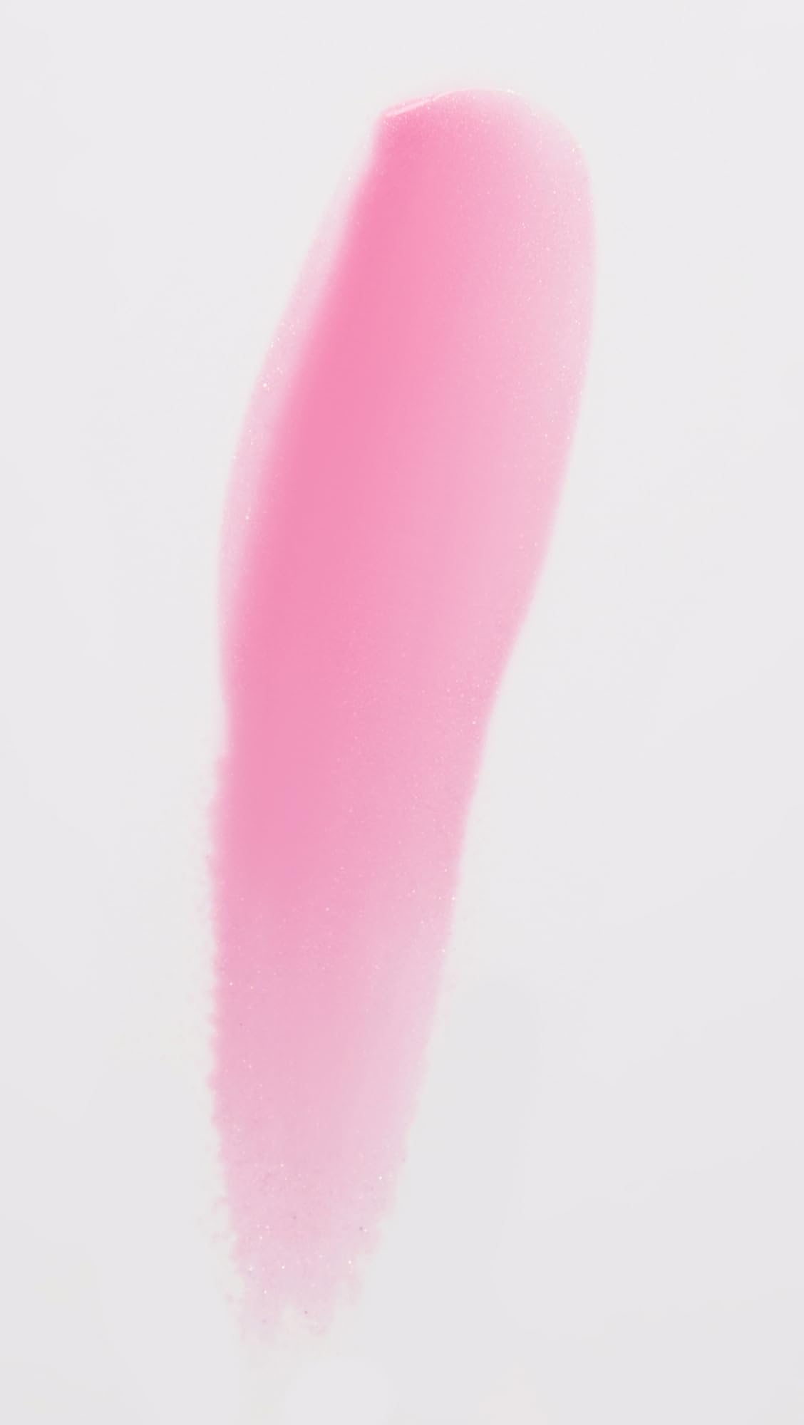 Lawless texture swipe of Daisy Pink highlighting glossy, hydrating finish