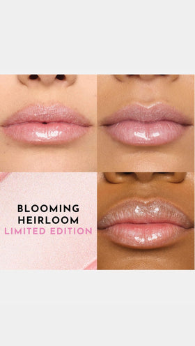 Model wearing Lawless gloss in Blooming Heirloom demonstrating glossy, plumped lips and everyday elegance