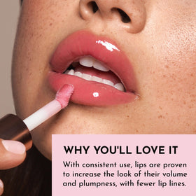 LAWLESS gloss layered over lipstick demonstrating added glass-like shine