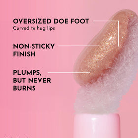 Lawless gloss texture swatched on skin highlighting glossy finish and hydrating effect