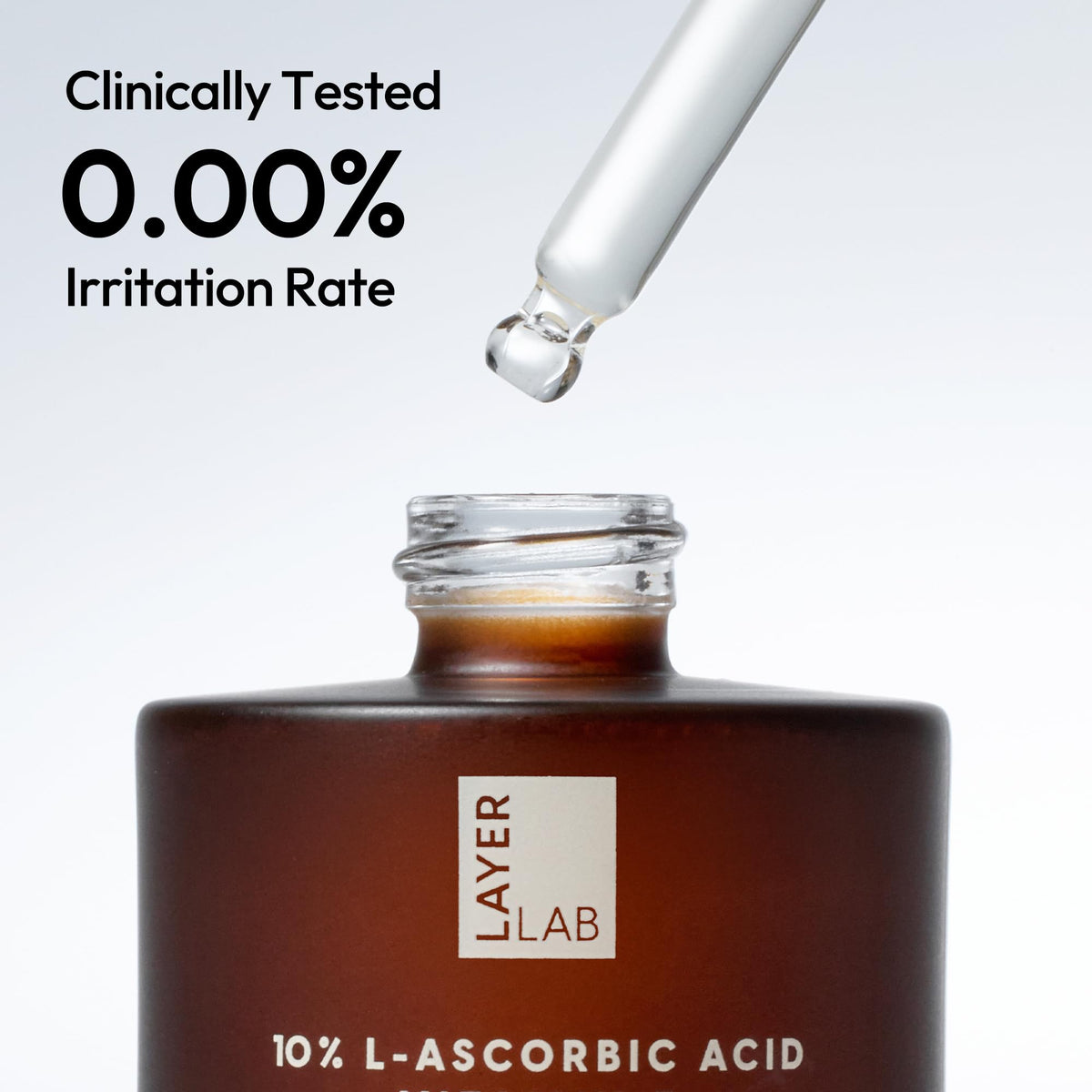 LAYERLAB packaging box with bottle staged to show giftable presentation and premium look