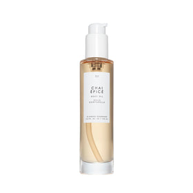 Le Monde Gourmand bottle front showing elegant packaging and inviting chai scent