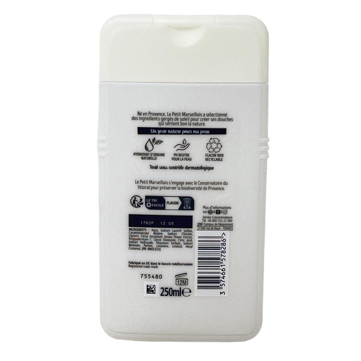 Le Petit Marseillais 250ml bottle in hand showing compact travel size