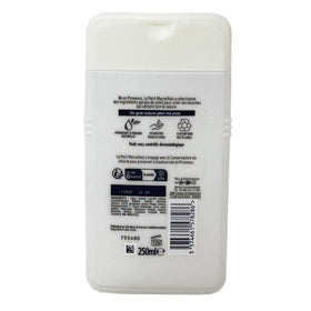 Le Petit Marseillais 250ml bottle in hand showing compact travel size