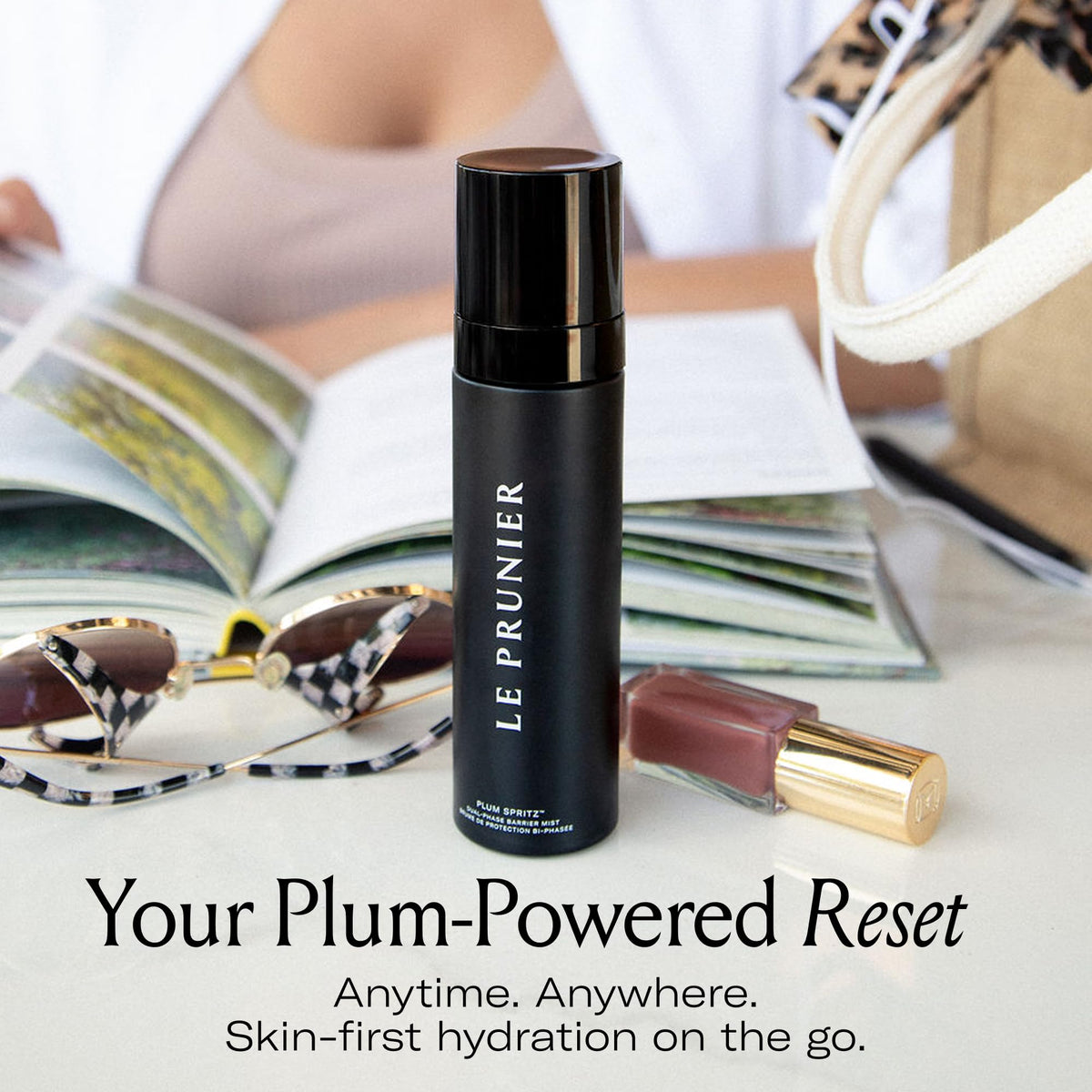 Le Prunier mist spraying onto face to refresh makeup and boost radiance
