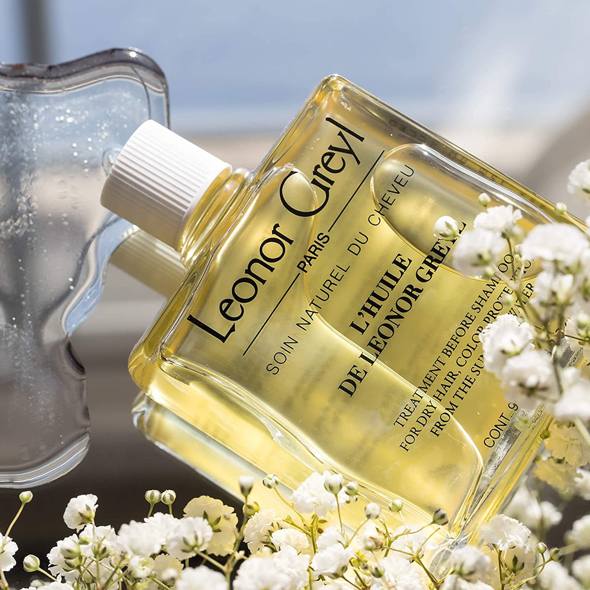 Leonor Greyl oil smoothed over dry hair giving frizz control and shine