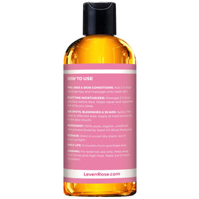 Leven Rose applying oil to hand demonstrating hydration and smooth finish