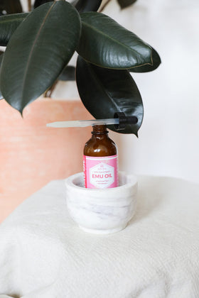Leven Rose bottle beside common items to show 4 oz size and travel-friendly benefit