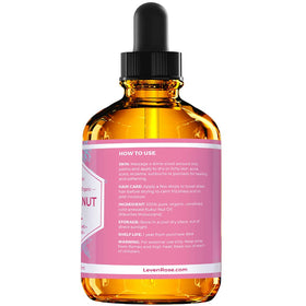 Leven Rose oil being applied to hair ends to reduce frizz and add shine