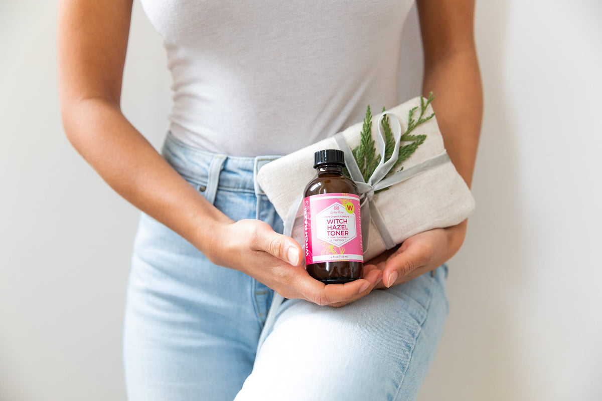 Leven Rose 4 oz bottle next to common items illustrating compact travel-friendly size