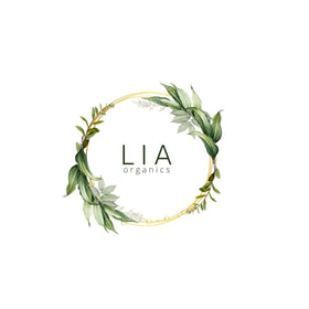 Lia Organics bottle outdoors being used to refresh hair during the day benefit