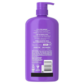 Person with smoother shiny hair after Aussie's shampoo showing visible improvement
