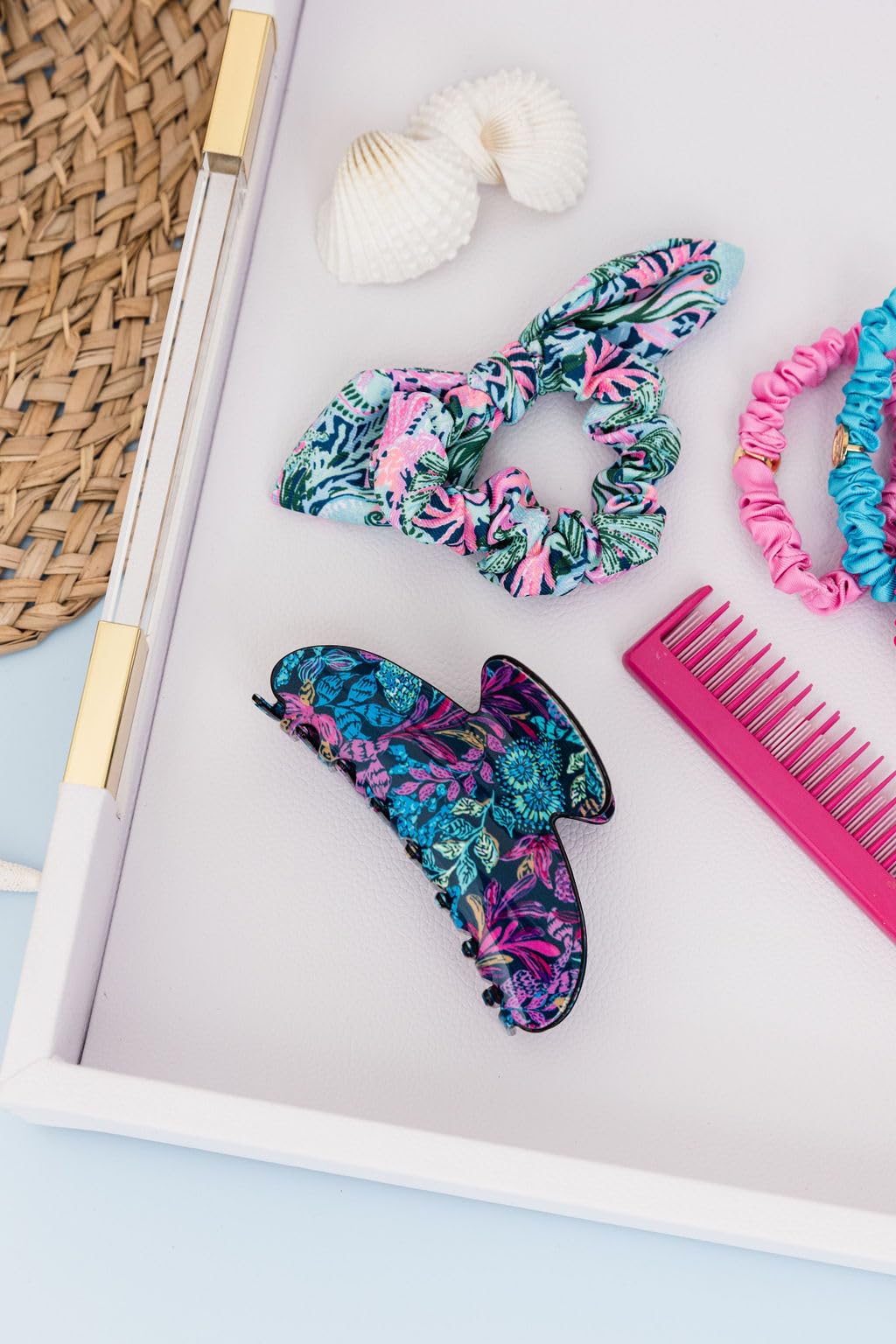 Lilly Pulitzer worn with beach outfit adding colorful finishing touch