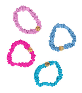 Lilly Pulitzer satin scrunchie close-up showing smooth fabric texture and shine