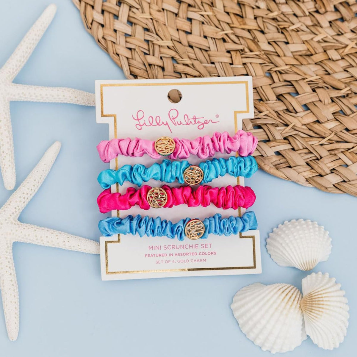 Lilly Pulitzer scrunchie worn around wrist as stylish accessory and practical hold